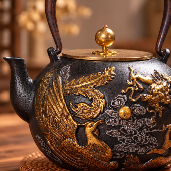 Close-up of the raised phoenix and dragon relief on the Longfeng cast iron teapot