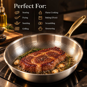 Ribeye steak searing in the hammered titanium frying pan with gold handle
