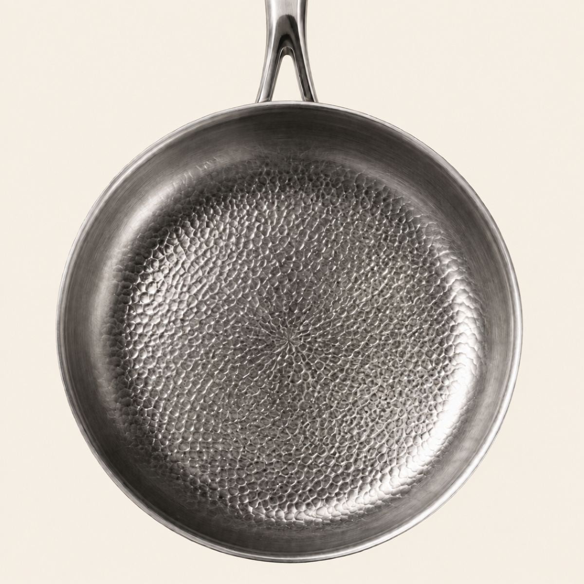 COOK ON TITANIUM. NOT ON A COATING.
