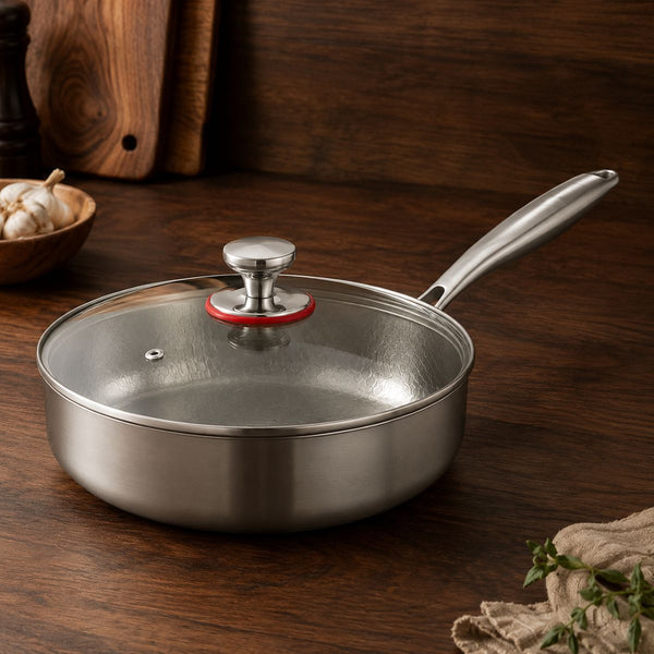 Deep titanium frying pan fitted with its tempered glass lid