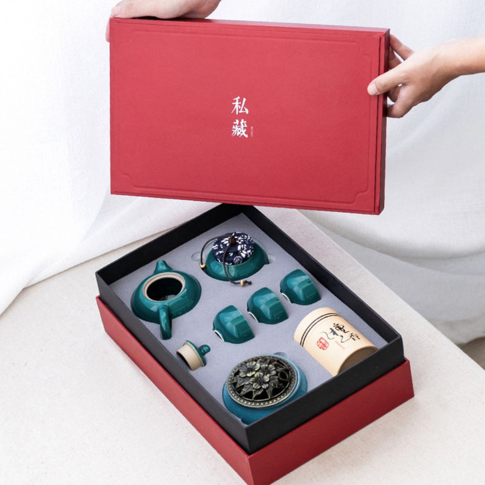 Red gift box opened on the Jing jade blue porcelain tea set