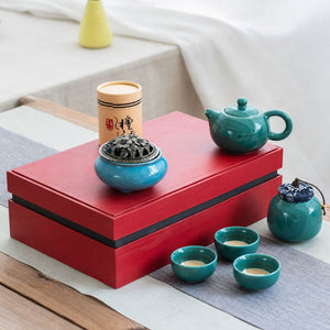 Jing jade blue tea set displayed on top of its closed gift box