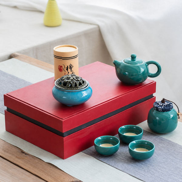Jing jade blue tea set displayed on top of its closed gift box