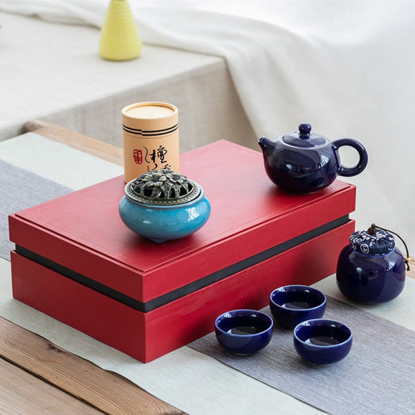 Jing midnight blue tea set displayed on top of its closed gift box
