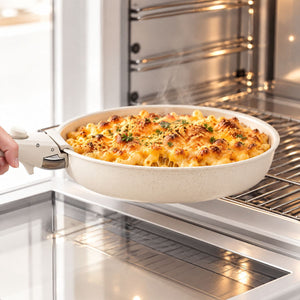 Kasane frying pan with a baked pasta dish coming out of the oven