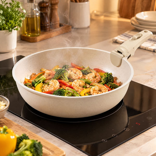 Kasane deep sauté pan cooking a shrimp stir-fry on an induction cooktop