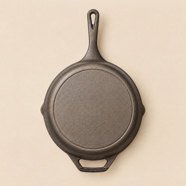 Underside of the Kazan cast iron skillet pan with its flat base