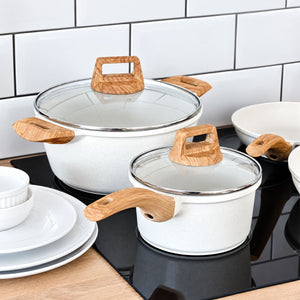 Mikage stockpot and saucepan with glass lids on an induction cooktop