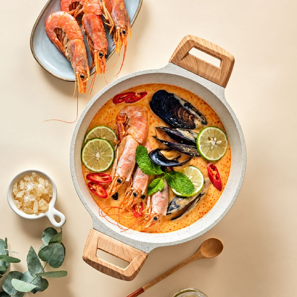 Seafood soup served in the Mikage stockpot
