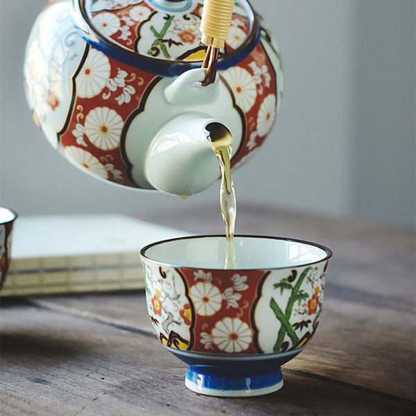 miyabi plum blossom teapot set pouring tea
