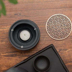 Top view of the Nagi tea warmer with a tealight candle and its metal top removed