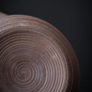Close-up of the ringed unglazed ceramic surface of the Sumi teapot