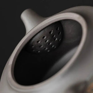 chinese tea set inside of the cup