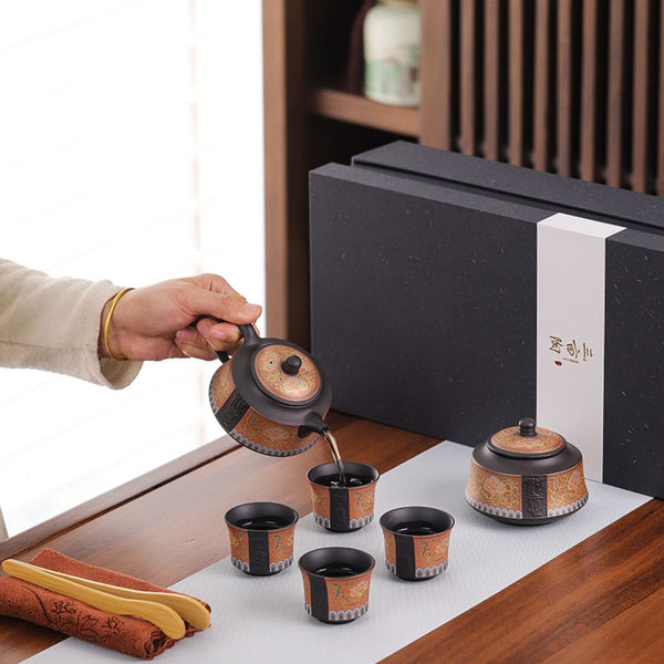 chinese tea set zhn bronze pouring tea in the cup